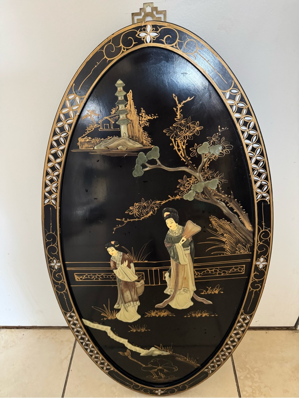 Vintage Japanese lacquer panel with mother -of pearl inlay and gold decoration.